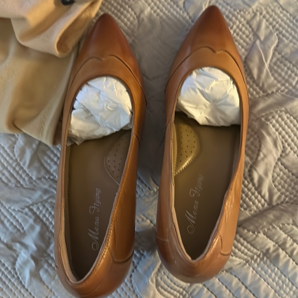 Handmade leather shoes, beautiful caramel color.